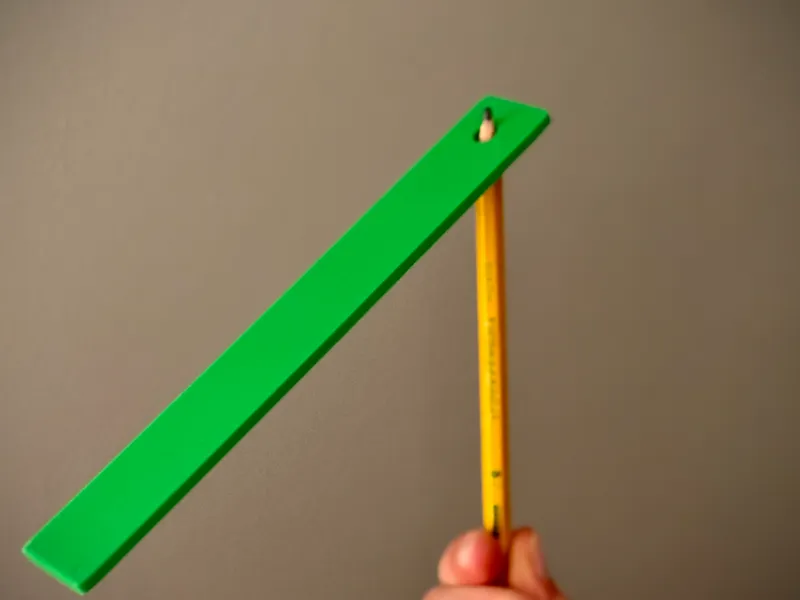 Weighted pencil spinner