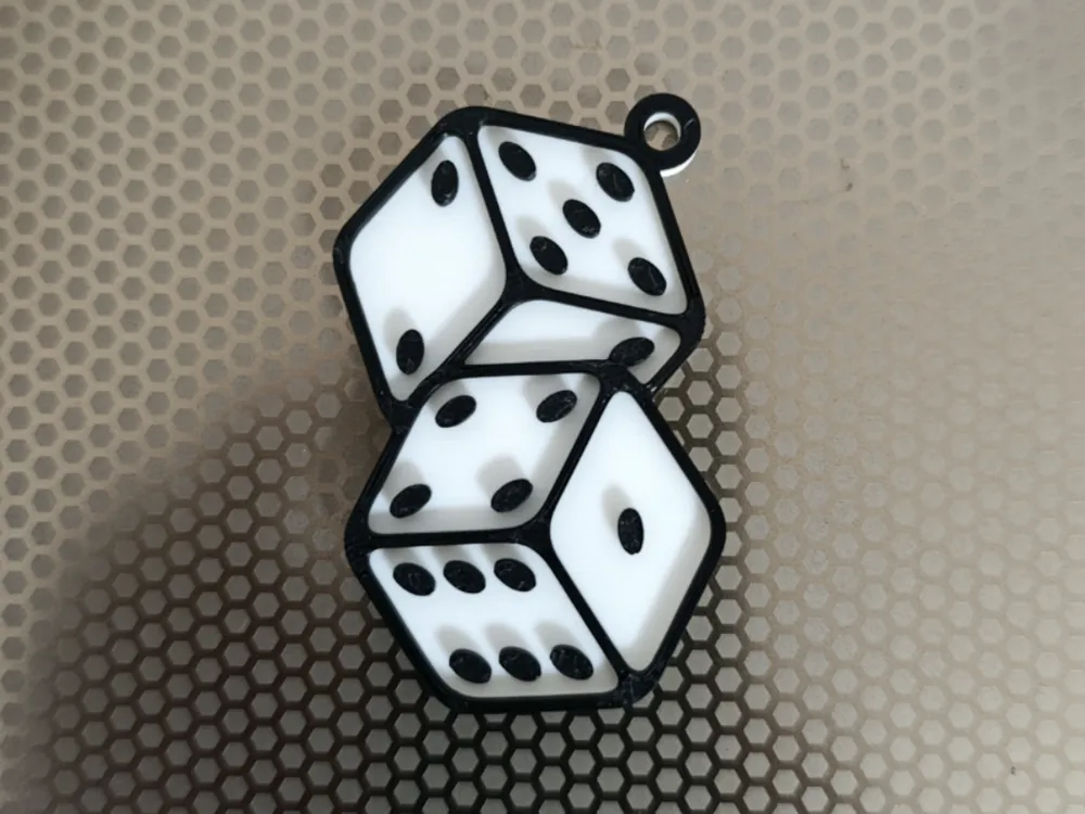 Llavero: Porte-clés 3D Dés. Referencia del modelo original.