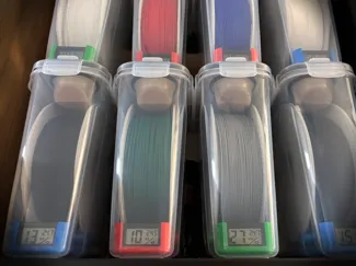 Cereal box spool holder with hygrometer