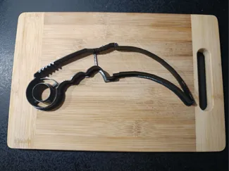 Real-size karambit cookie cutter