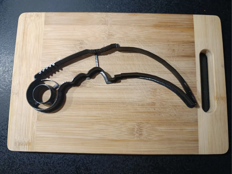 Real-size karambit cookie cutter