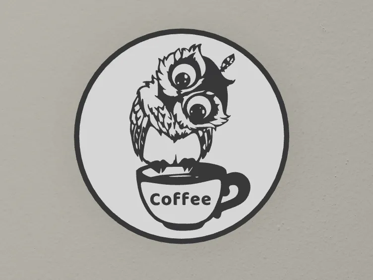 Owl on cup of coffee decoration
