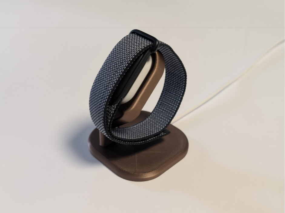 Fitbit air charging stand with cable routing  