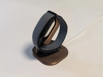 Fitbit air charging stand with cable routing  