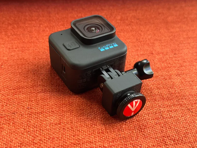 GoPro Mount for tripod with 1/4-20 thread.