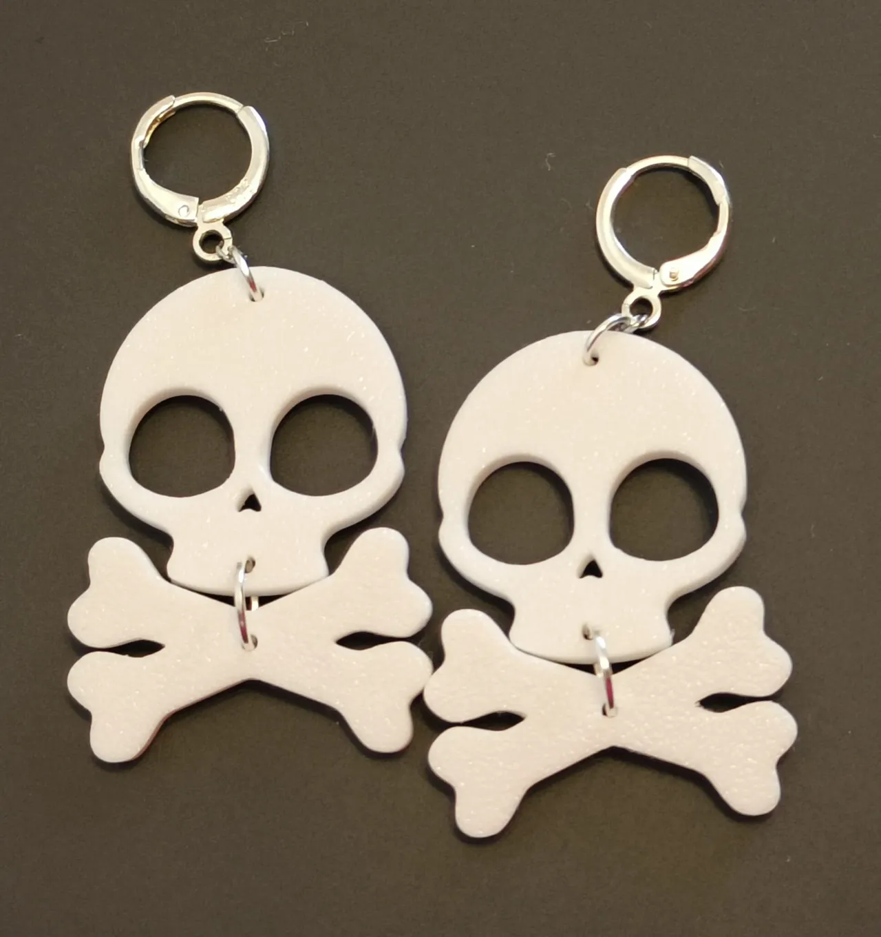 Skull and bones earrings view 2