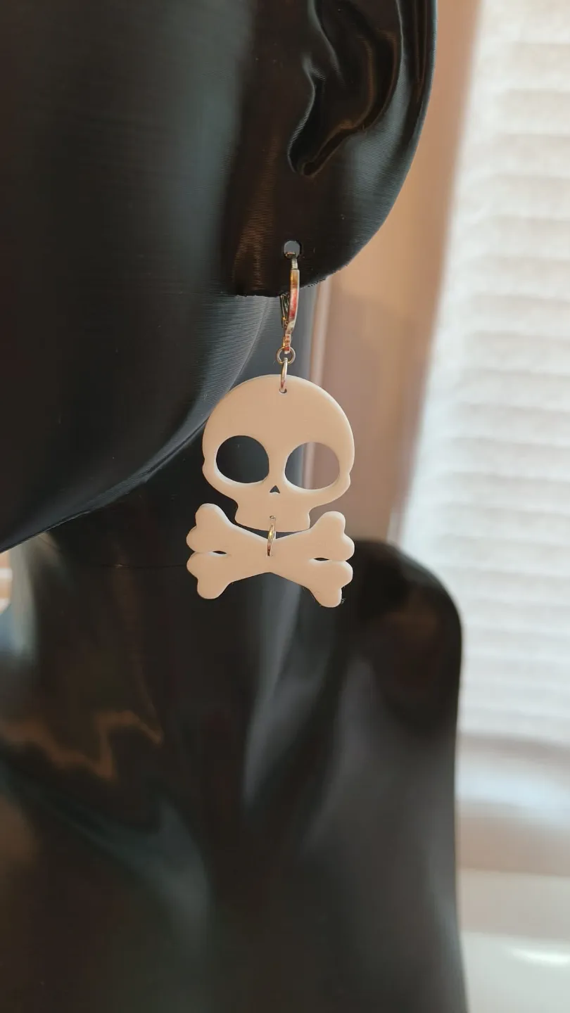 Skull and bones earrings view 3