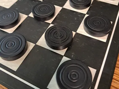 Checker piece