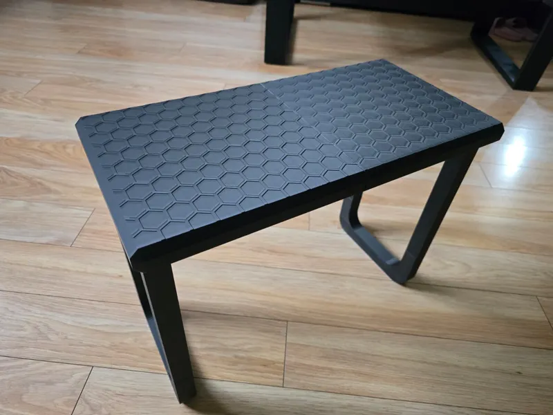 A bedside table for your bed with a honeycomb
