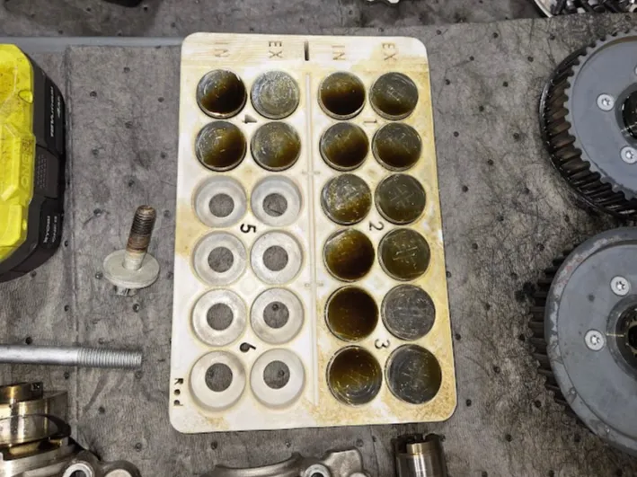 Volvo bucket tappet tray
