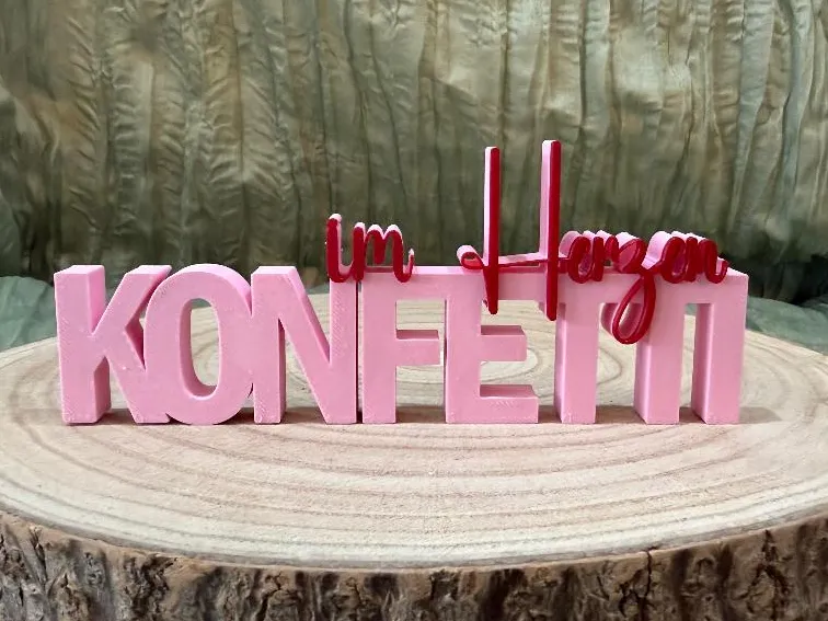 Schriftzug Konfetti im Herzen