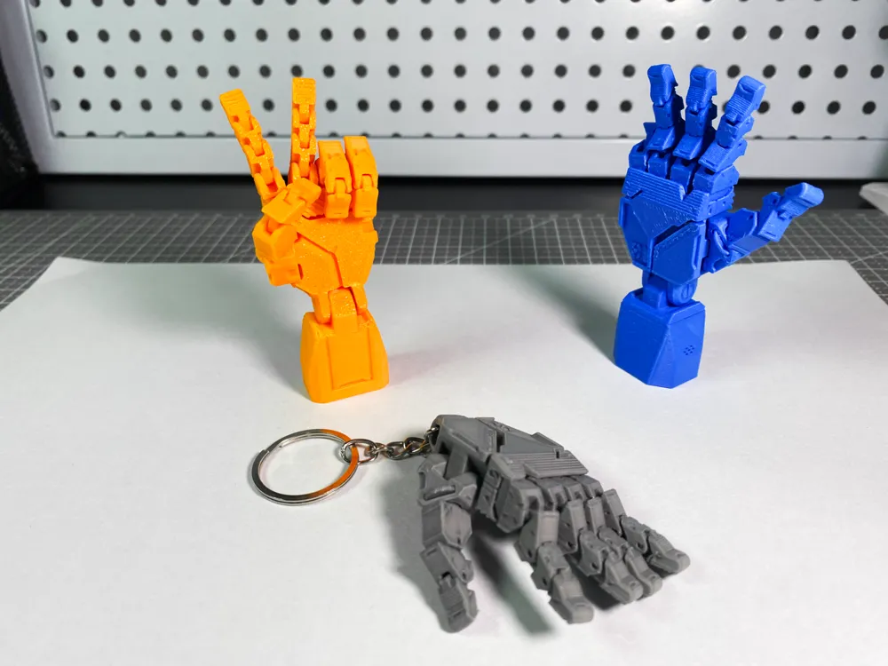 Accesorio para impresora 3D: One‑piece printed super mini robotic palm-movable. Referencia del modelo original.