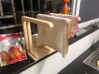 A sturdy, practical, and aesthetically pleasing dishcloth drying rack