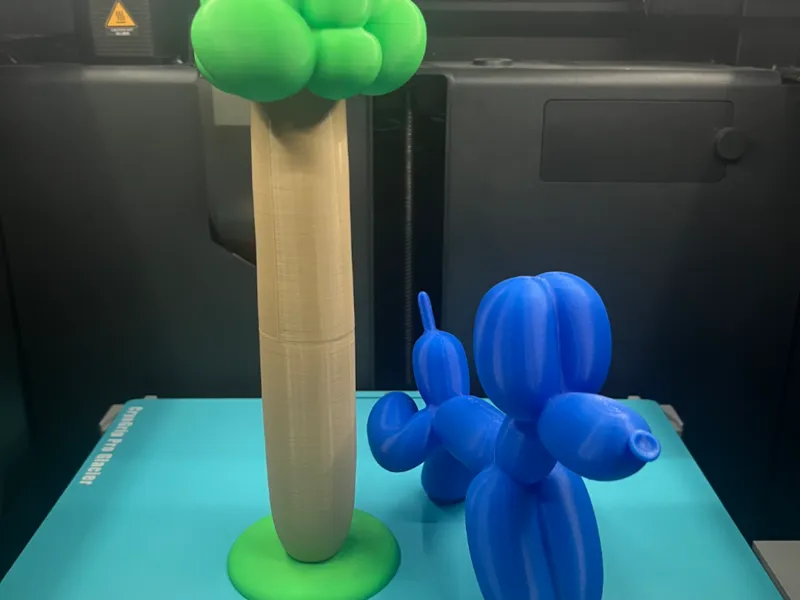 Ballon Dog pees on tree