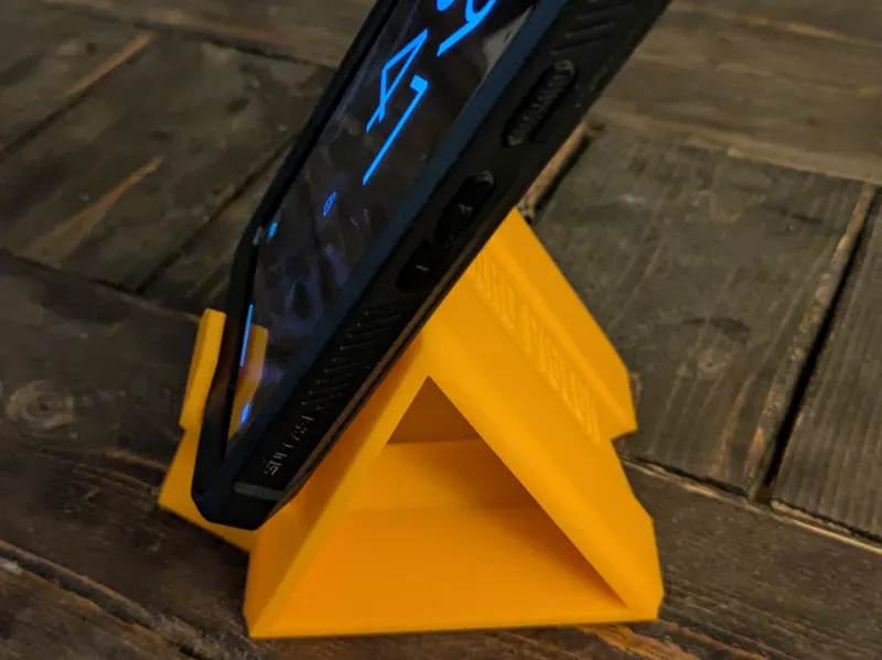 Phone stand with hole for charger