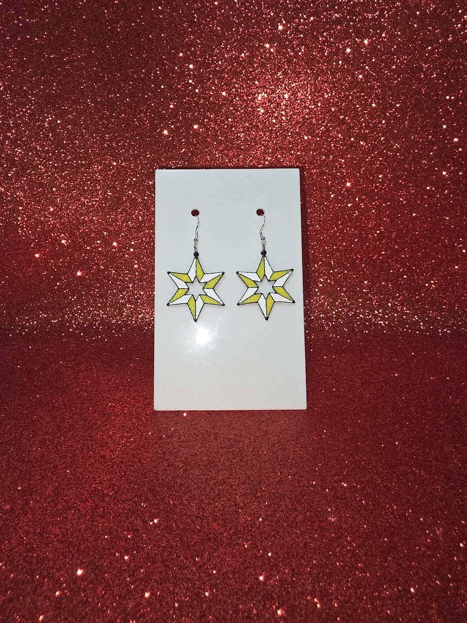 Gold star earrings view 2