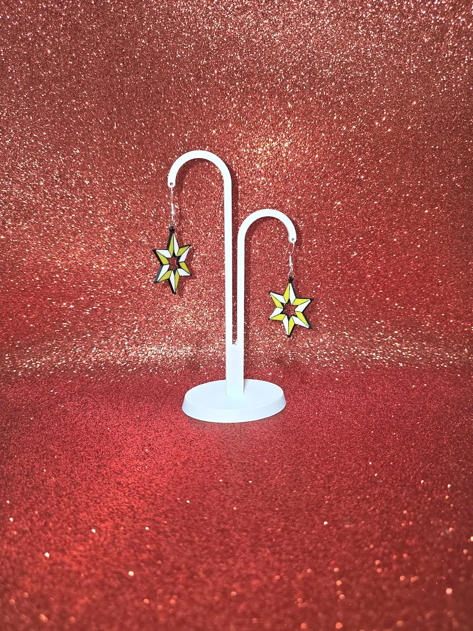 Gold star earrings view 3