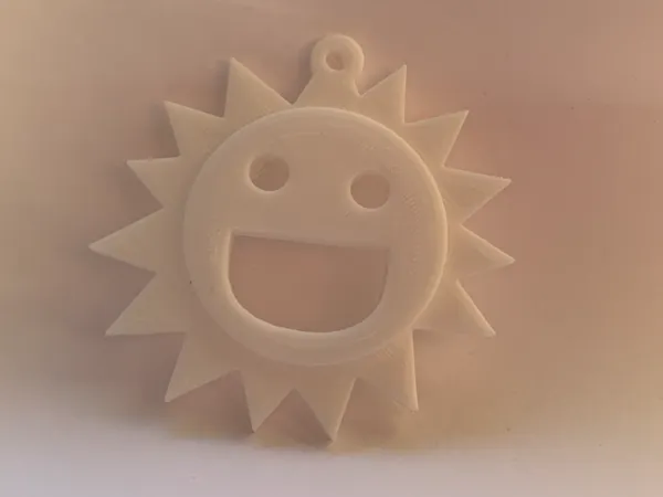 Porte-clés soleil souriant