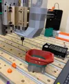 Support for a 65mm Spindle and 63.3mm (2.5") Dust Hose