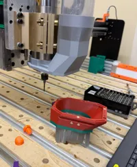 Support for a 65mm Spindle and 63.3mm (2.5") Dust Hose