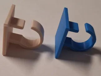 Clip with hook for hanging string lights