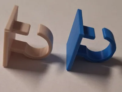 Clip with hook for hanging string lights