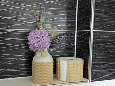 Decorative toilet paper holder with a rattan look 