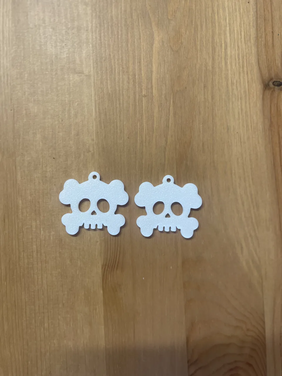 skull earrings view 2