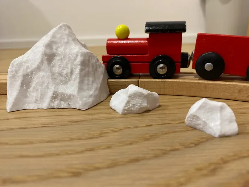 Snow pile for wooden train tracks