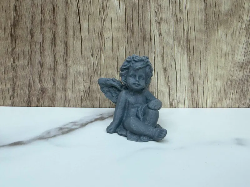 sitting little angel