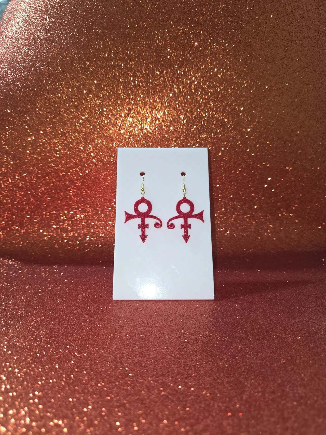 Prince love symbol earrings view 2