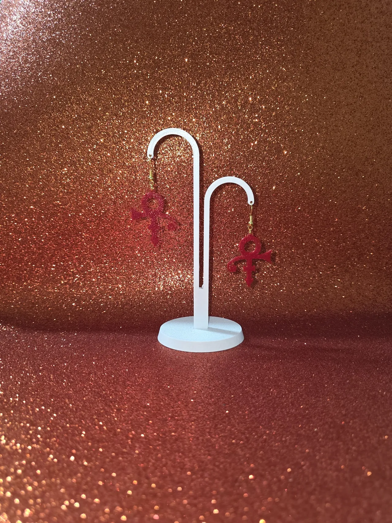 Prince love symbol earrings view 3