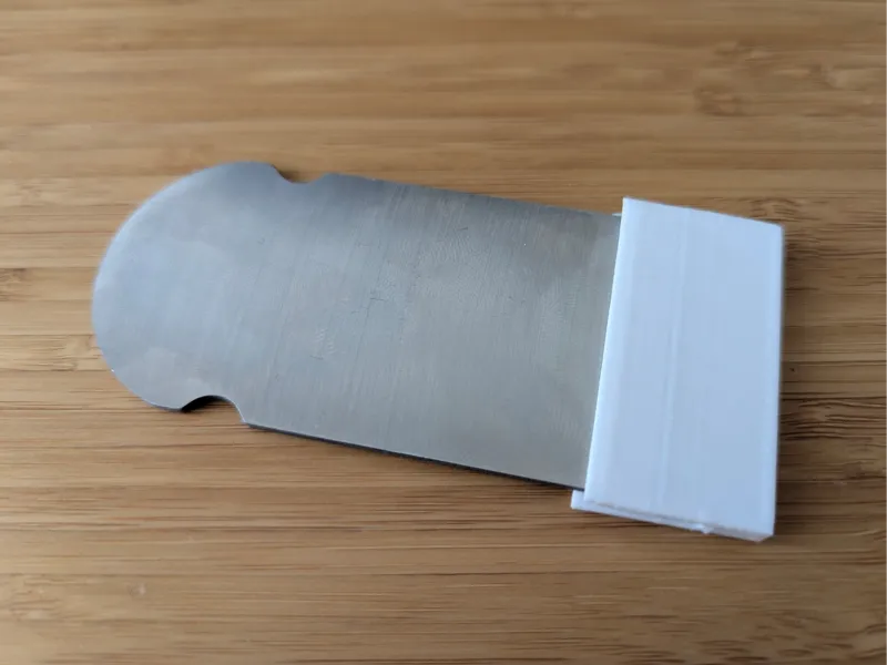 Wood planer blade guard