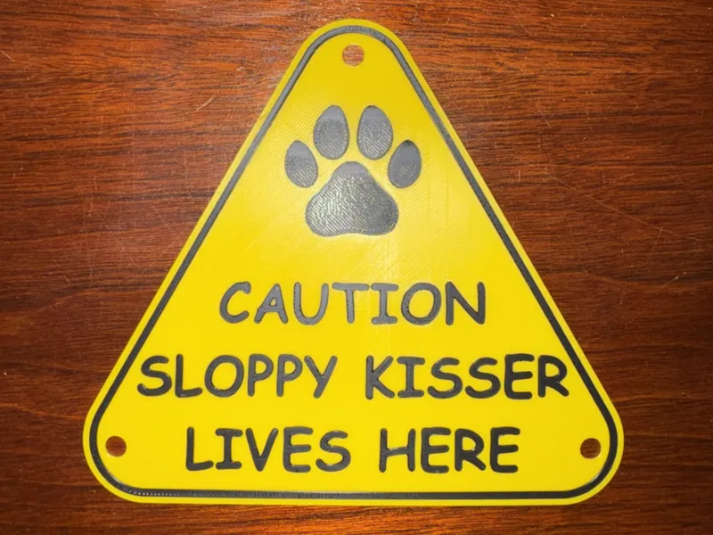 Caution: Sloppy Kisser Lives Here