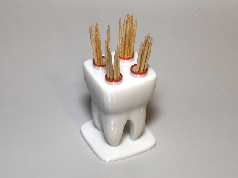 Tooth shaped toothpick stand