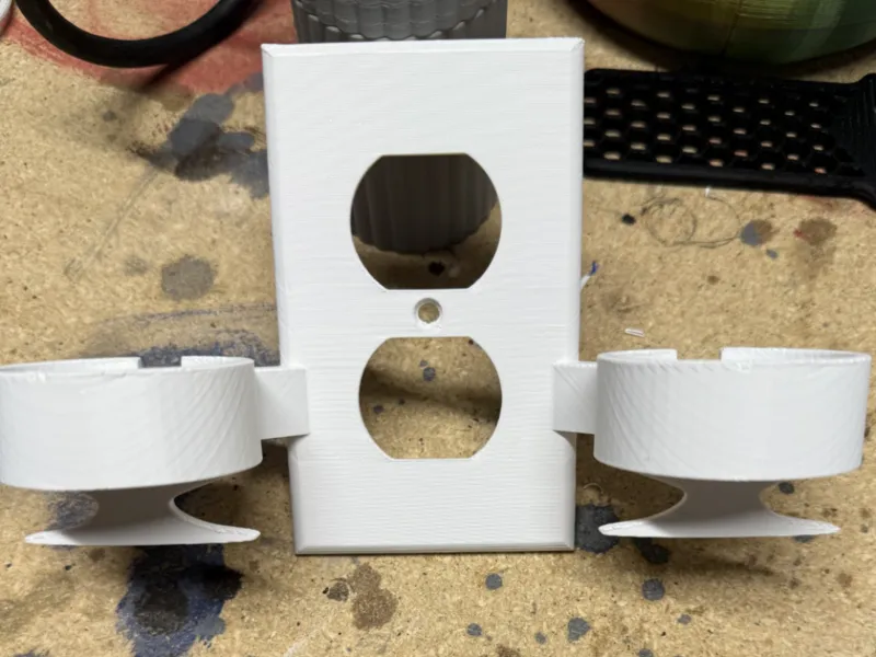 Dual Sonicare toothbrush outlet holder
