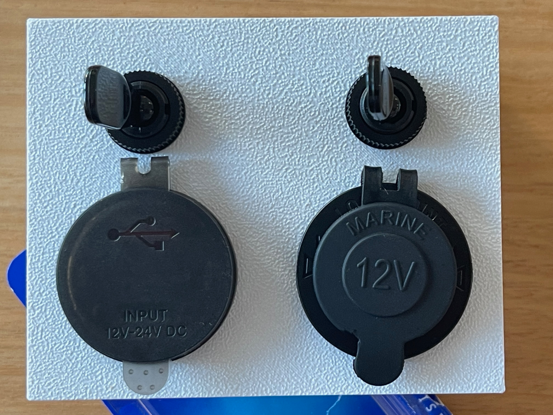 Dual socket with switch holes