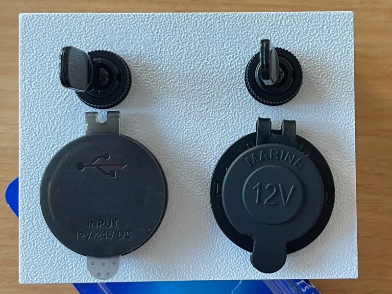 Dual socket with switch holes