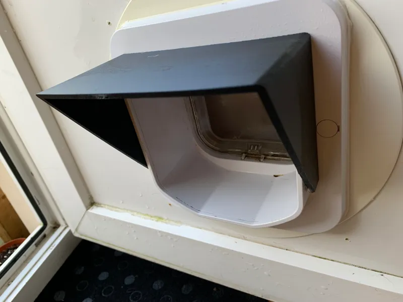 Cat flap rain cover