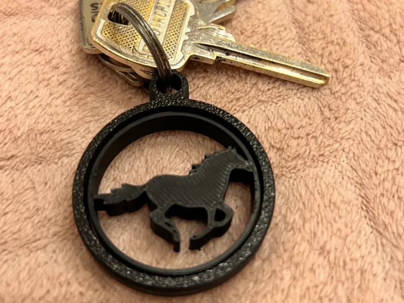rotating horse keychain