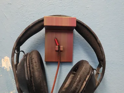 Wall mounted headset stand
