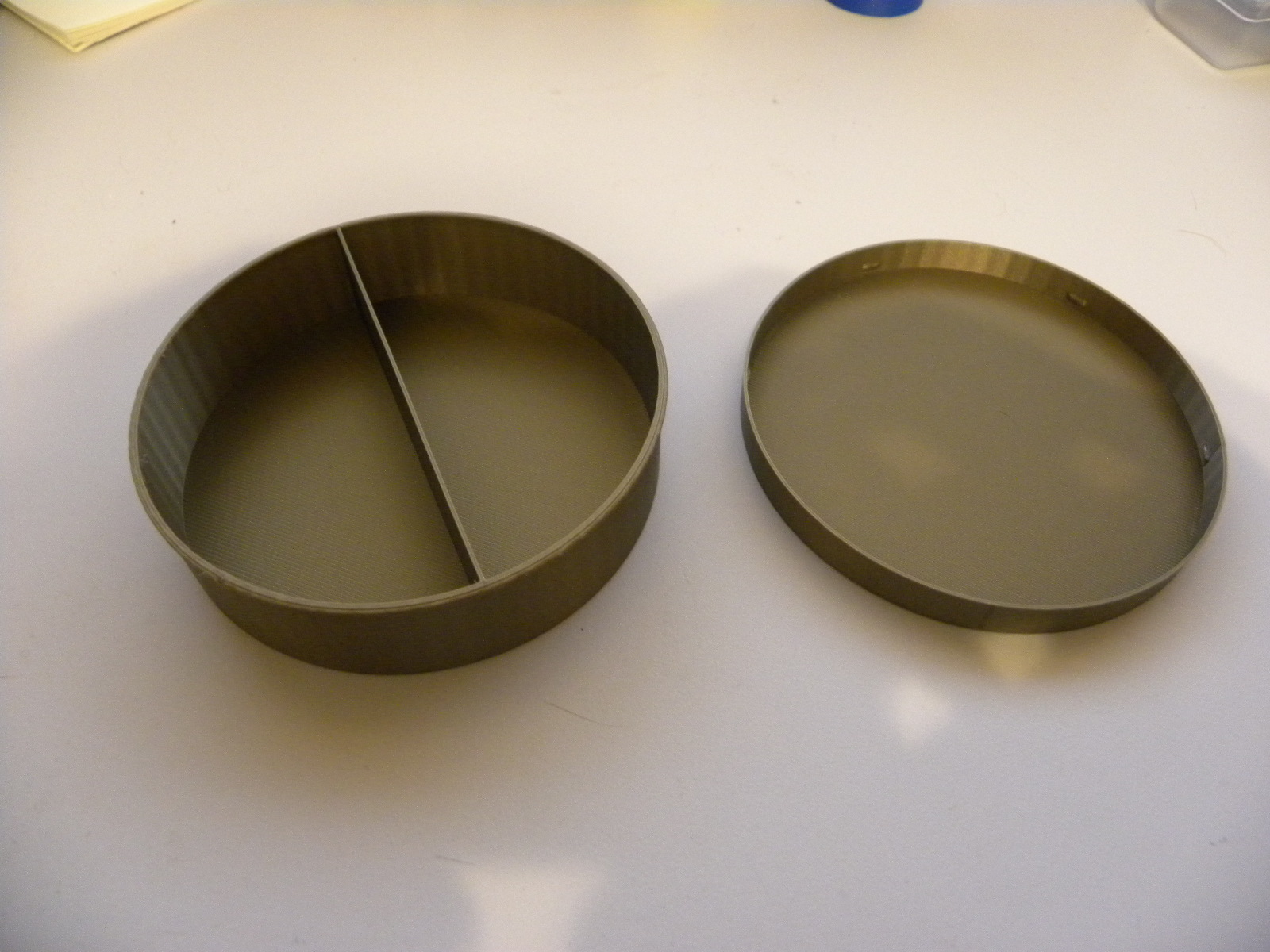 Tape box with two compartment divider