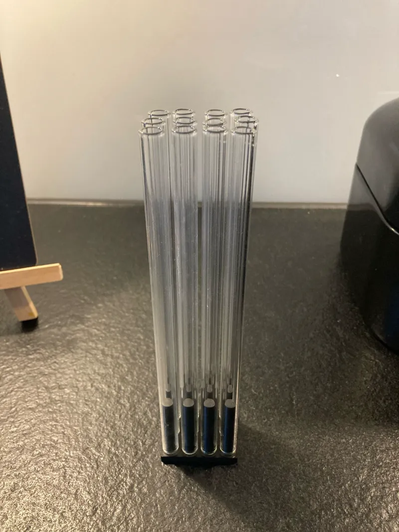 Glass drinking straw holder