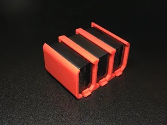 Sony NP-FW50 battery holder with thumb tab