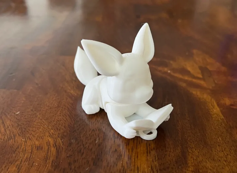 Articulated Eevee Keychain with Book
