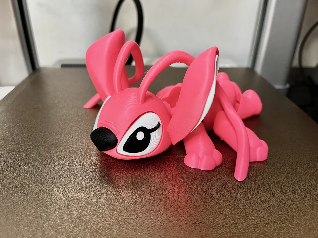Articulated Pink toy NOAMS view 4