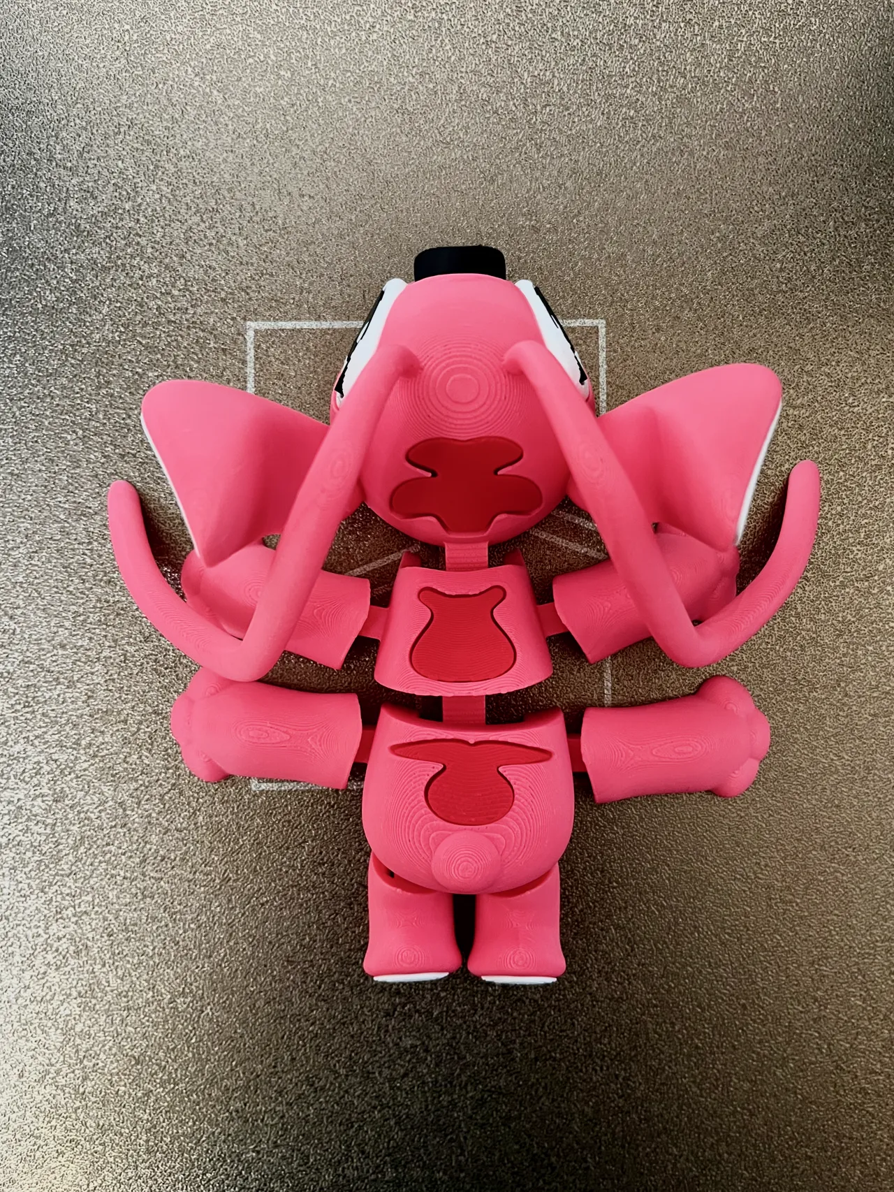 Articulated Pink toy NOAMS view 2
