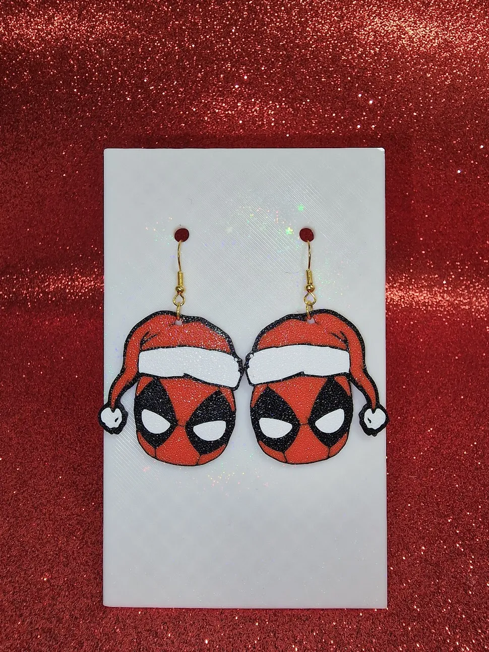 Santa Deadpool earrings view 2