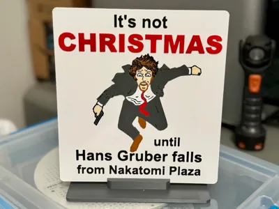 Hans Gruber Falls From Nakatomi (sign and stand)