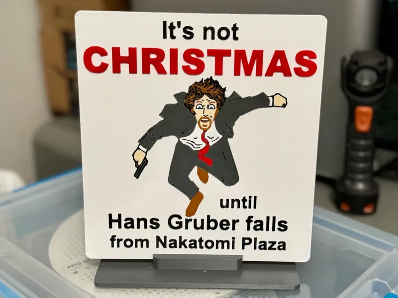 Hans Gruber Falls From Nakatomi (sign and stand)